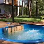 Apartment Luksusowy Apartament Pod Lasem, Otwock -Shared Garden, Sauna, Wood Hot Tub! Hot Tub Seasonal May To October